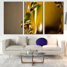 Load image into Gallery viewer, buddha statue canvas wall art yellow peaceful buddha close up 3 piece canvas print yellow buddha meditation statue canvas set In Living Room
