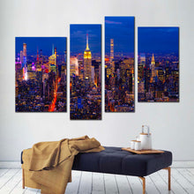 Load image into Gallery viewer, city lights canvas wall art blue sky empire state building 4 piece canvas set yellow midtown manhattan canvas print In Living Room
