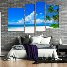 Load image into Gallery viewer, cloudy ocean canvas print blue ocean sky 4 piece canvas wall art green trees ocean beach canvas set in bedroom
