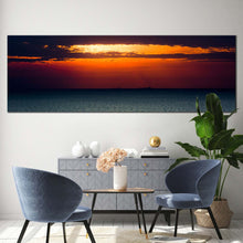 Load image into Gallery viewer, cloudy  sunset  canvas  wall  art  beautiful  orange  ocean  sky  1  piece  canvas  artwork  yellow  sun  behind  clouds  canvas  print  blue  sea  wide  canvas In Living Room
