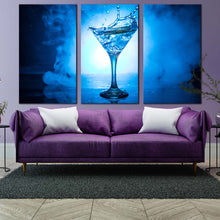 Load image into Gallery viewer, cocktail splash canvas wall art white blue background martini cocktail 3 piece canvas cocktail splashing triptych canvas print In Living Room
