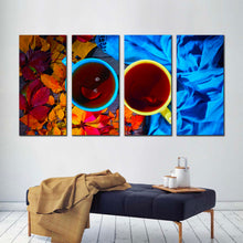 Load image into Gallery viewer, cup leaves canvas wall art tea from above 4 piece canvas print blue yellow mugs multiple canvas In Living room
