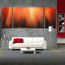 Load image into Gallery viewer, deep ocean sunlight underwater red orange abstract 3 panel canvas print In Living Room
