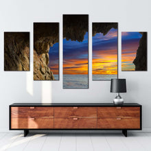 Load image into Gallery viewer, dramatic clouds canvas wall art orange blue sky ocean arches 5 piece canvas print brown cave ocean mountain canvas set
