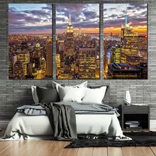 Load image into Gallery viewer, dramatic clouds canvas wall art yellow grey sky cityscape 3 piece canvas new york city skyline triptych canvas print empire state building canvas set In Bedroom
