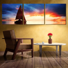 Load image into Gallery viewer, dramatic  sunset  boat  blue  sky  Sailboats  ocean  sunset  triptych  wall  art For Your Living Room
