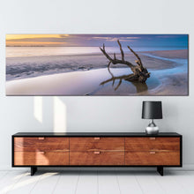 Load image into Gallery viewer, driftwood  beach  canvas  wall  art  ocean  beach  in  jekyll  island  panoramic  canvas  print  yellow  sky  ocean  wide  canvas  georgia  white  ocean  beach  canvas  artwork In Living Room
