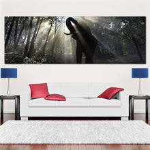 Load image into Gallery viewer, elephant  forest  canvas  wall  art  elephant  in  yellow  sunrise  panoramic  canvas  print  elephant  green  trees  canvas  artwork In Living Room
