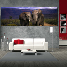 Load image into Gallery viewer, elephant  hug  canvas  wall  art  grey  elephant  love  panoramic  canvas  print  elephant  in  green  nature  wide  canvas For Living Room
