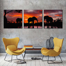 Load image into Gallery viewer, elephants  family  canvas  wall  art  black  group  elephant  3  piece  canvas  print  elephant  in  orange  nature  multiple  canvas For Living Room
