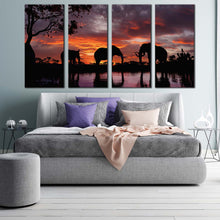 Load image into Gallery viewer, elephants lake canvas wall art black elephant family 4 piece canvas set elephants orange sunset canvas print For Your Bedroom
