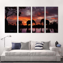 Load image into Gallery viewer, elephants lake canvas wall art black elephant family 4 piece canvas set elephants orange sunset canvas print For Living room
