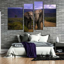 Load image into Gallery viewer, elephants love canvas print grey elephant couple 4 piece canvas wall art elephant kissing in green scenery multiple canvas in bedroom
