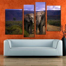 Load image into Gallery viewer, elephants love canvas print grey elephant couple 4 piece canvas wall art elephant kissing in green scenery multiple canvas
