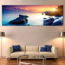 Load image into Gallery viewer, europe  ocean  canvas  wall  art  blue  ukraine  ocean  rocks  boulders  1  piece  canvas  print  crimea  dramatic  yellow  sunset  sky  canvas  artwork In Living Room
