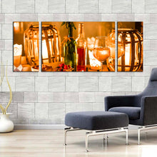 Load image into Gallery viewer, evening  wine  canvas  wall  art  orange  wine  glass  and  candles  3  piece  canvas  cosy  white  wine  canvas  set  green  wine  bottle  canvas  print In Living Room
