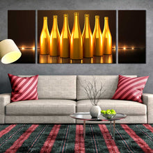 Load image into Gallery viewer, golden champagne bottles dark background 3 piece canvas artwork In Living Room
