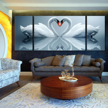 Load image into Gallery viewer, heart  swans  canvas  wall  art  beautiful  grey  background  3  piece  multi  canvas  artwork  romantic  love  white  swans  reflection  triptych  canvas  print In Living Room
