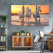 Load image into Gallery viewer, horses beach canvas wall art white horses sea 3 piece multiple canvas horses yellow sunset sky triptych canvas print
