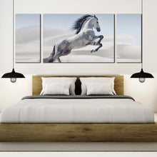 Load image into Gallery viewer, horses  galloping  canvas  wall  art  grey  horse  in  air  3  piece  canvas  print  white  horse  in  white  dust  triptych  multi  canvas  artwork In Bedroom

