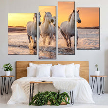 Load image into Gallery viewer, horses heard canvas print yellow sunset horses beach 4 piece canvas wall art white horses freedom canvas set in bedroom
