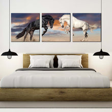 Load image into Gallery viewer, horses  playing  canvas  wall  art  horses  fight  3  piece  multiple  canvas  black  white  horses  rearing  triptych  canvas  print In Bedroom
