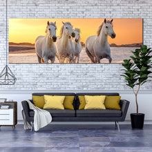 Load image into Gallery viewer, horses  sea  canvas  wall  art  horses  yellow  sunset  sky  panoramic  canvas  print  white  horses  running  forward  wide  canvas In Living Room
