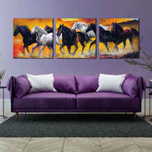 Load image into Gallery viewer, horses  water  canvas  print  black  white  horses  herd  3  piece  canvas  wall  art  horses  orange  sky  beach  multi  canvas In Living Room
