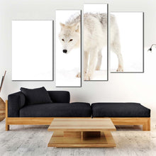 Load image into Gallery viewer, isolated wolf canvas wall art white wolf walking 4 piece canvas arctic animal canvas print for living room
