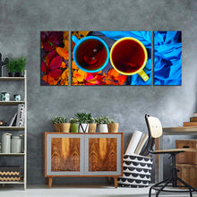 Load image into Gallery viewer, kitchen  cup  canvas  wall  art  cups  of  tea  3  piece  canvas  yellow  blue  tea  cups  close  up  triptych  canvas  print
