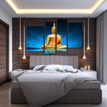 Load image into Gallery viewer, lord buddha canvas wall art blue scenic lighting background buddha canvas set gold buddha meditation 4 piece multi canvas in bedroom
