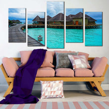 Load image into Gallery viewer, maldives sea canvas print beautiful blue sky ocean multi canvas artwork brown ocean wooden bridge water villa 5 piece canvas wall art In Living Room
