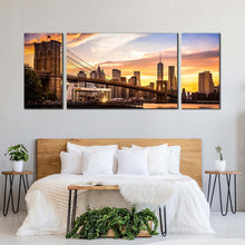 Load image into Gallery viewer, manhattan bridge canvas print brown new york cityscape multiple canvas brooklyn bridge yellow sunset sky 3 piece canvas wall art In Bedroom
