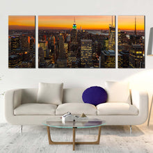 Load image into Gallery viewer, manhattan cityscape canvas wall art yellow sky city skyline 3 piece canvas set grey midtown manhattan new york city canvas print In Living Room
