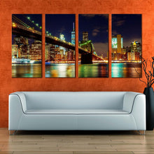 Load image into Gallery viewer, manhattan skyline canvas wall art colorful new york city lights 4 piece canvas print blue sky brooklyn bridge cityscape canvas set For Living Room
