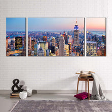 Load image into Gallery viewer, manhattan sunset canvas wall art blue nyc at dawn 3 piece canvas print yellow new york city skyline triptych multi canvas
