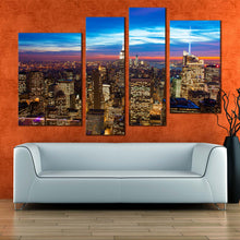 Load image into Gallery viewer, midtown manhattan canvas wall art brown new york city canvas set blue sky cityscape canvas print nyc at evening 4 piece canvas in living room
