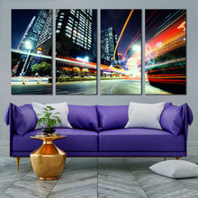 Load image into Gallery viewer, modern busy city traffic lights trail at dark 4 piece canvas print In Living room
