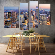 Load image into Gallery viewer, nyc cityscape canvas wall art blue new york city skyline canvas print midtown manhattan yellow sunset sky 4 piece multi canvas in living room
