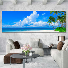 Load image into Gallery viewer, ocean  beach  canvas  wall  art  blue  cloudy  ocean  sky  panoramic  canvas  print  green  trees  ocean  canvas  artwork In Living Room
