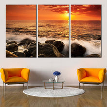 Load image into Gallery viewer, ocean boulders canvas print orange seascape waves multi canvas yellow sunset sea ocean rocks 3 piece canvas wall art In Living Room
