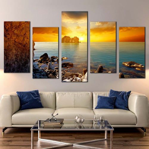 ocean boulders canvas wall art blue sea ocean rocks 5 piece canvas print yellow orange cloudy sunset sky multi canvas artwork For Living room