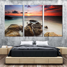 Load image into Gallery viewer, ocean boulders canvas wall art yellow red cloudy sky ocean canvas set brown ocean rocks beach 3 piece canvas print For  Bedroom
