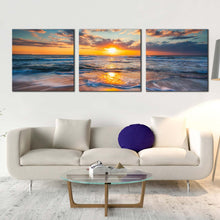 Load image into Gallery viewer, ocean  sky  canvas  print  dramatic  blue  seascape  waves  3  piece  multi  canvas  orange  sunset  ocean  triptych  canvas  wall  art In Living Room
