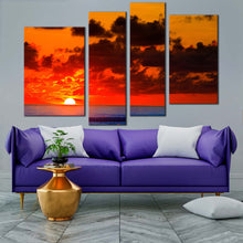 Load image into Gallery viewer, ocean sunset canvas wall art blue ocean waves canvas print dramatic cloudy red sky ocean 4 piece canvas set in living room
