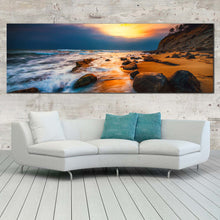 Load image into Gallery viewer, ocean  sunset  canvas  wall  art  brown  ocean  rock  boulders  1  piece  canvas  print  yellow  cloudy  sky  seascape  canvas  artwork In Living Room
