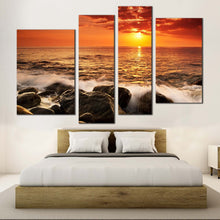 Load image into Gallery viewer, ocean sunset canvas wall art ocean rock boulders canvas print yellow sunset at sea canvas set orange seascape waves 4 piece multiple canvas in bedroom
