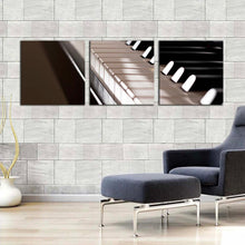 Load image into Gallery viewer, piano  instrument  canvas  wall  art  piano  music  3  piece  canvas  set  black  white  isolated  piano  keyboard  triptych  canvas  print In Living Room
