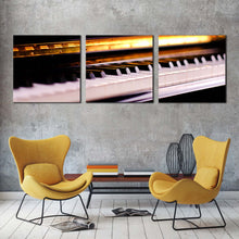 Load image into Gallery viewer, piano  lesson  canvas  print  orange  piano  close  up  3  piece  multi  canvas  artwork  white  piano  keyboard  notes  canvas  wall  art For Living Room
