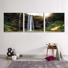 Load image into Gallery viewer, rainforest  waterfall  canvas  wall  art  seljalandsfoss  falls  green  nature  canvas  print  yellow  sunset  iceland  landscape  waterfall  3  piece  canvas  set
